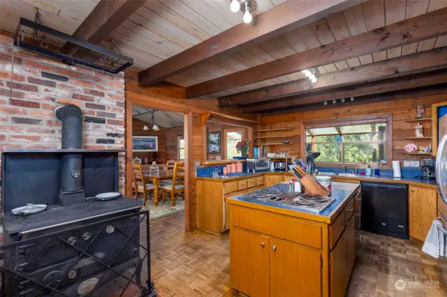 An antique Irish cookstove anchors the Kitchen