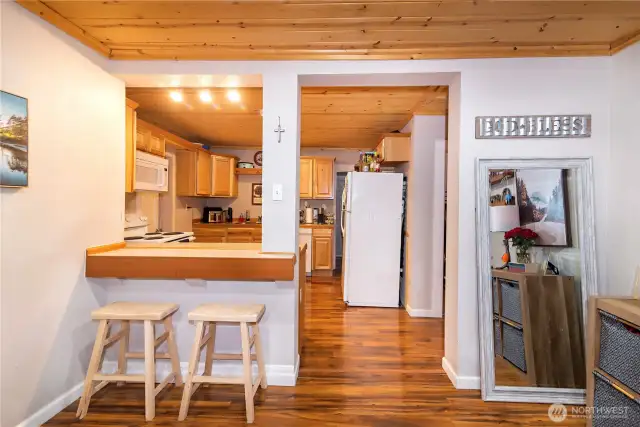 Eating bar off of the kitchen.