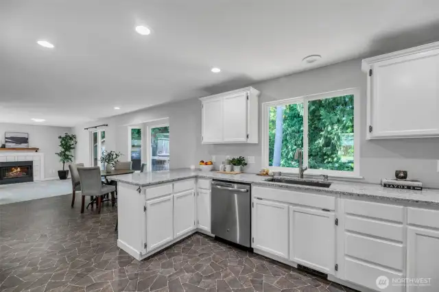Open flow from kitchen to eating space, into family room.