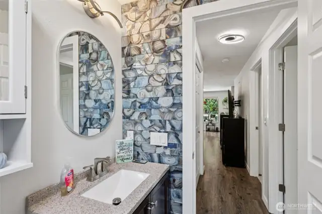 Main floor bath - Elysium Aura Shell Blue tile accent wall.