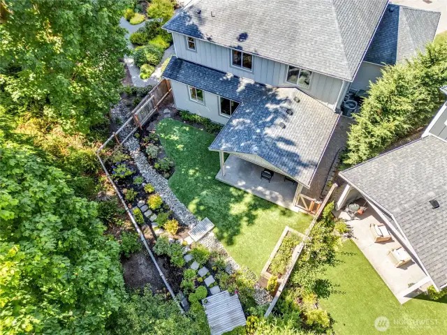 Fully fenced with the backyard surrounded by greenery!