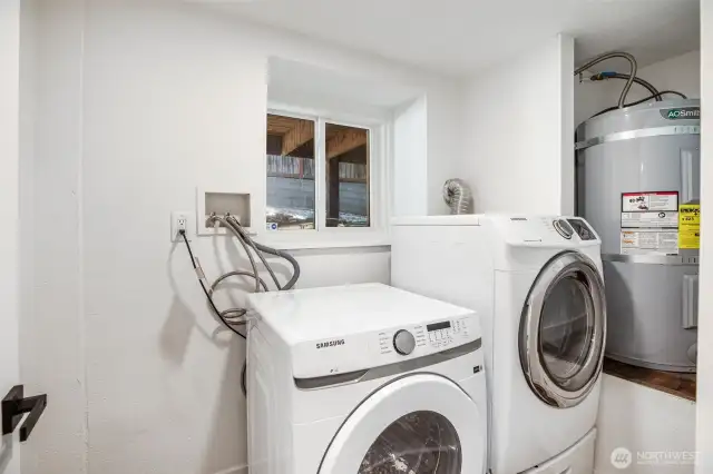 Utility room located on the lower level with full size washer & dryer.
