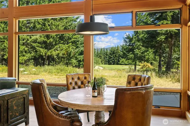 Such a great nook for socializing as you look out to the 9th green of Tumble Creek Golf Course.