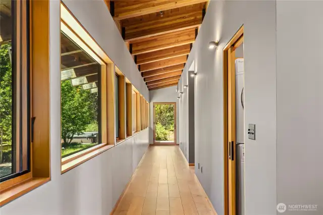 The gallery leads to 3 bedrooms and 2 bathrooms.