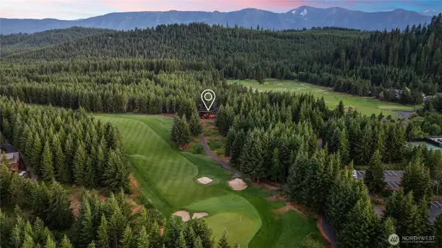 The incredible residence, 9th fairway and 9th green under the evening sky.