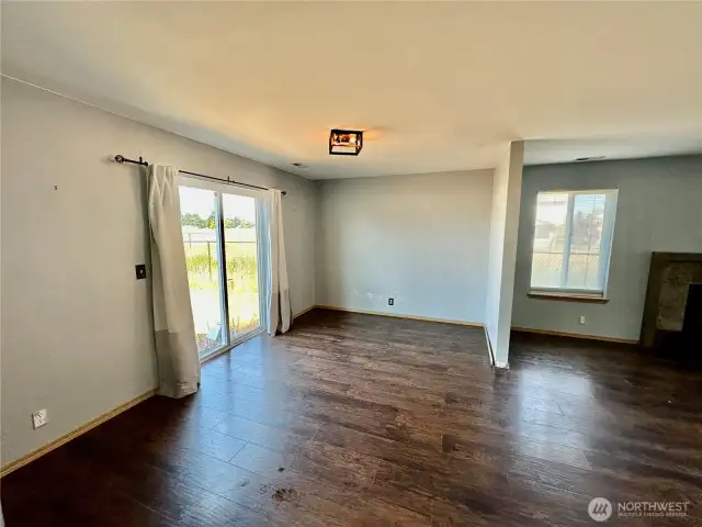 Main floor with open dining area that adjoins the living and kitchen areas.