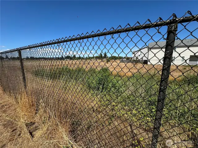Property adjoins the community space.