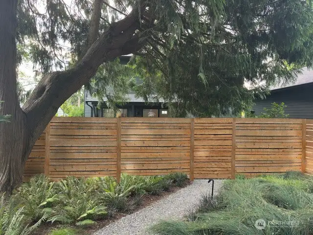 Rendering of where new fence separating the 2 homes will be if they sell separately.