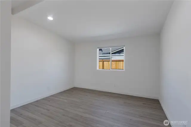 Extra finished room (with a closet) across from bathroom.