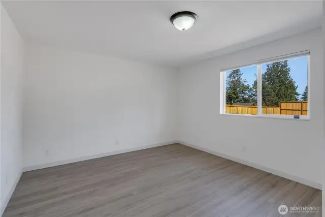 Second bedroom overlooks back yard.