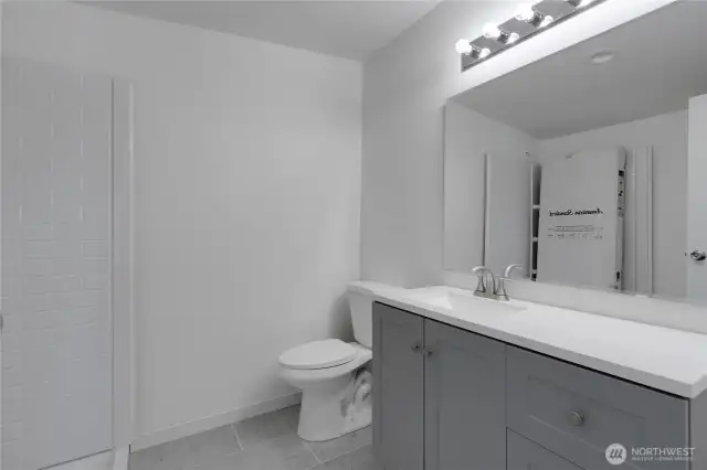 Serene primary bathroom. The new shower doors will be installed ASAP.