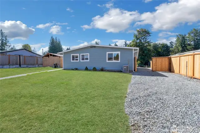 Virtually enhanced grass. It won't take much to get this back yard this green again.