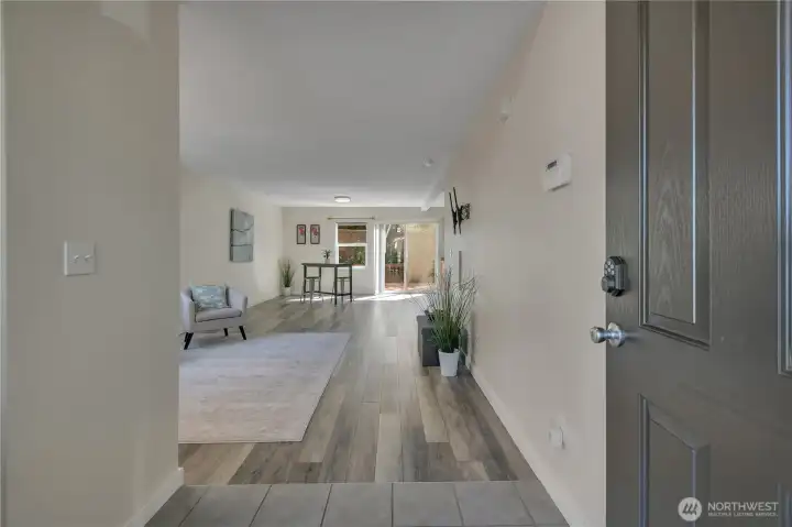 Come on in. Powder room and 2 closets tucked away to the left of the entrance.