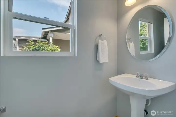 Powder room tucked away for privacy, and fresh air.