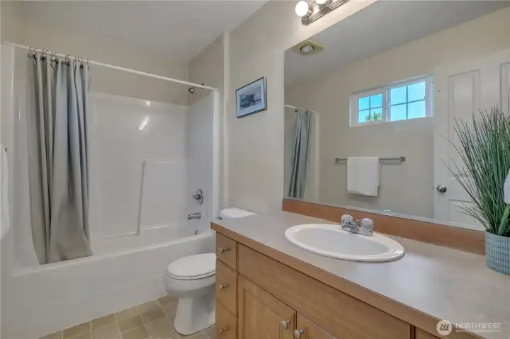 How perfect is this for guests?  And a window!  We love windows in bathrooms.