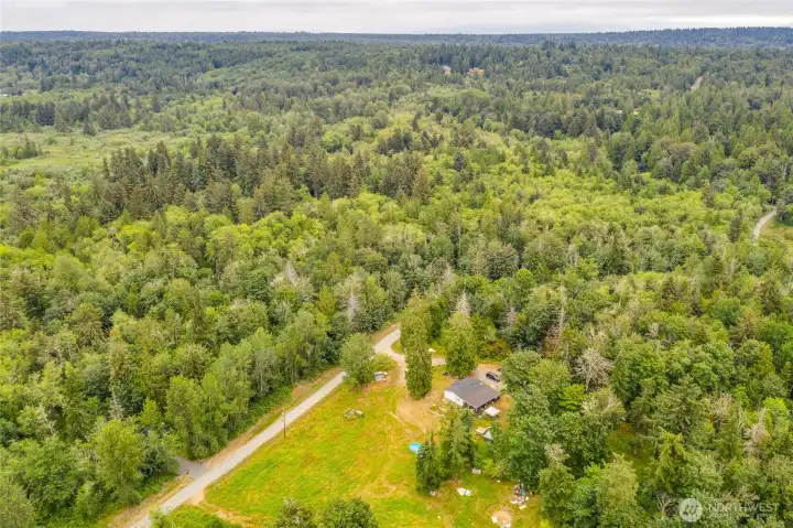 best building area is to the right of the home in photo