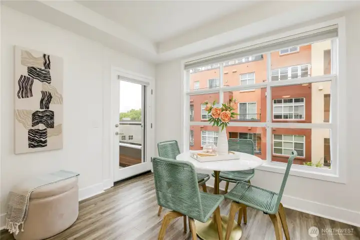 A wall of insulated windows allows for natural light to fill the room. Or simply pull the shades for complete privacy.