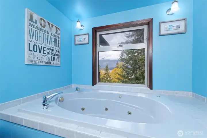 Soak in the jetted tub and take in the views.