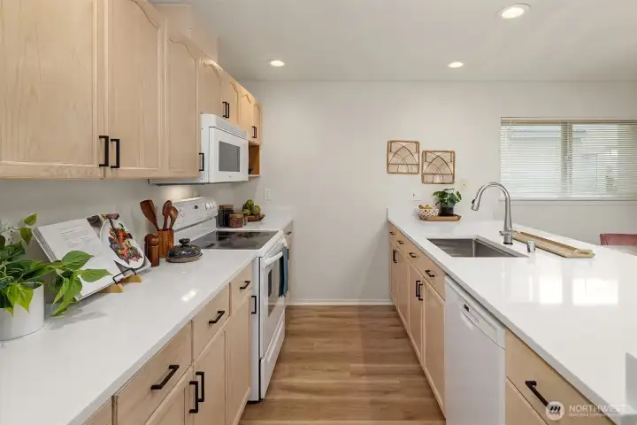 Kitchen with fresh quartz countertops!