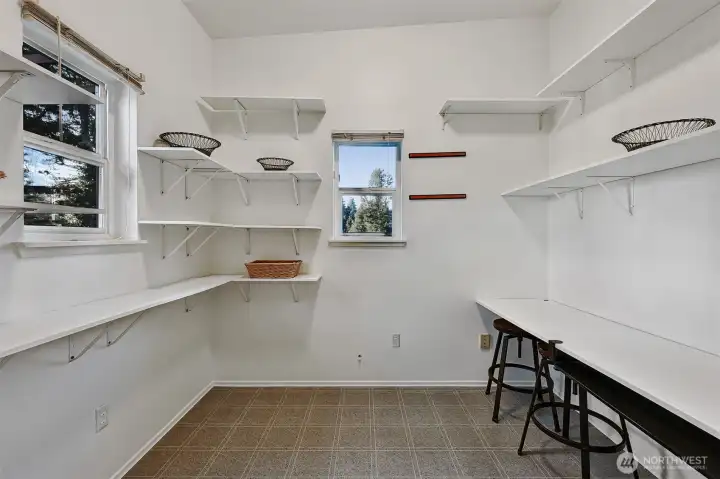 Legit walk-in pantry holds the Costco goods AND space for a desk.