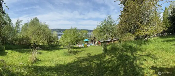 Lush greenery with great Lake Views on large lot