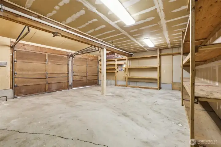 Oversize 2 car garage 490 sq ft. with plenty of shelves