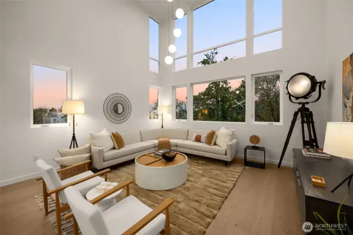 Massive walls of windows keep the home bright & airy