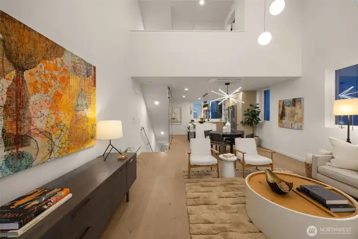 While the connected living, dining, and kitchen spaces bring a cohesive flow to the home