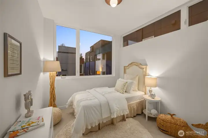 Additional bedrooms flood natural light from the clerestroy windows