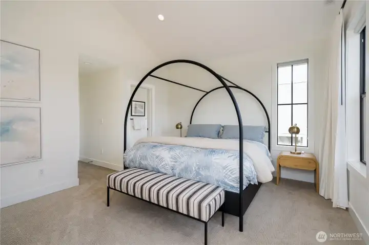 Primary Suite: Four Seasons® mattress, black out drapery, vaulted ceilings, reading nook with views of The Butte.