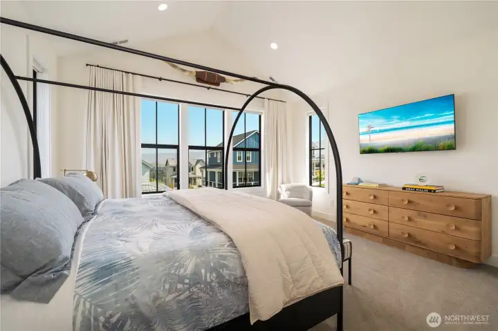 Primary Suite: Four Seasons® mattress, black out drapery, vaulted ceilings, reading nook with views of The Butte.