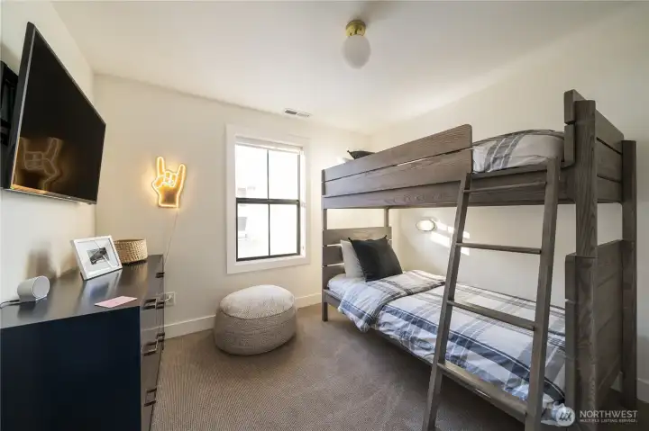 The Bunk Room: Bunk lights, TV, surround sound for gaming, a great hang out space for gamers/movie time.