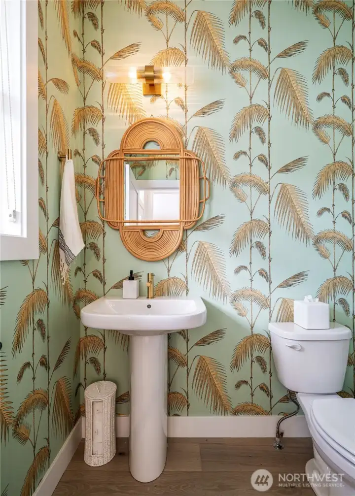 Powder Bath: Wall paper theme, (not shown: storage closet, & the backlit  wine rack.