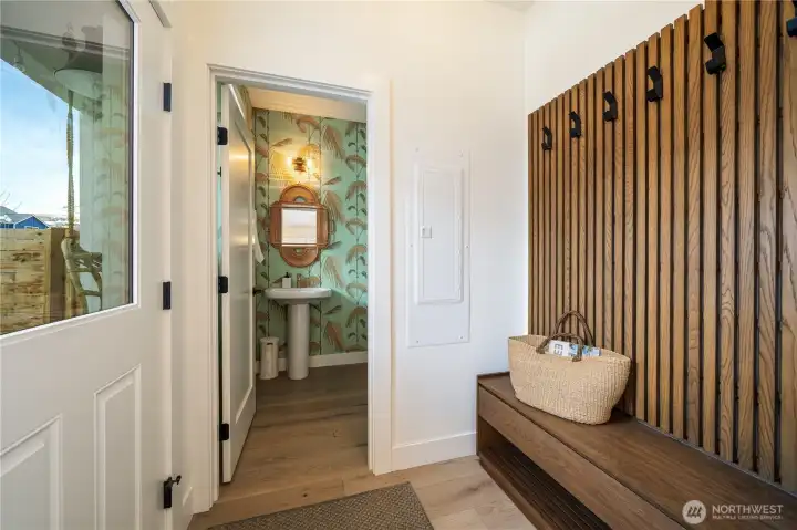 Mud Room: door out to the back patio, and to the powder bath/storage closet.