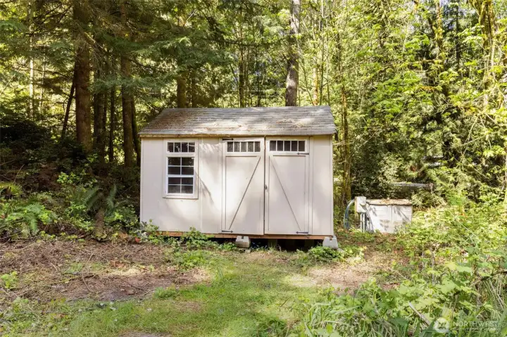 Storage Shed & Well House (behind)