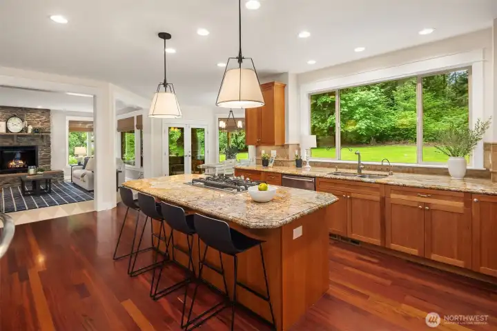 Another view of this expansive kitchen and family room - perfect for hosting during the holidays or for summer get-togethers with family and friends. Another view of this expansive kitchen and family room - perfect for hosting during the holidays or for summer get-togethers with family and friends.