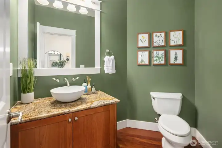 Classy 1/2 bathroom on main floor between the office and the family room. Classy 1/2 bathroom on main floor between the office and the family room.