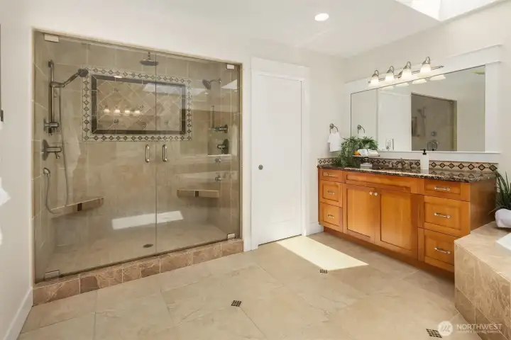 This shower will make you feel like you are at a spa with three shower heads (including the rain head), two sitting areas, and three massaging body jets. This shower will make you feel like you are at a spa with three shower heads (including the rain head), two sitting areas, and three massaging body jets.