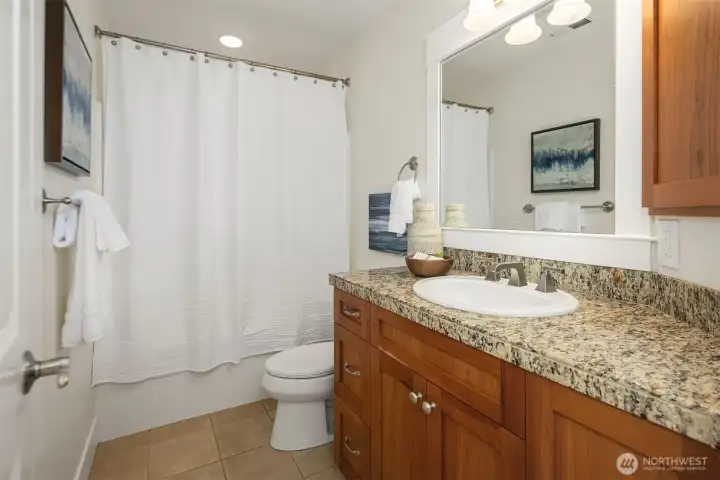 Third full bathroom upstairs, with dual doors for access (from hallway or 3rd bedroom). Third full bathroom upstairs, with dual doors for access (from hallway or 3rd bedroom).
