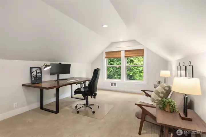 The second alcove is being used as an at-home office. The second alcove is being used as an at-home office.