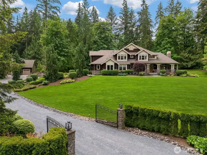 This luxury home offers incredible amenities: 6 car garage, detached studio, 4 bedrooms plus guest suite, sauna, hot tub, cold plunge, fire pit, basketball court, covered patio with pizza oven and fireplace, wooded trails, & more! This luxury home offers incredible amenities: 6 car garage, detached studio, 4 bedrooms plus guest suite, sauna, hot tub, cold plunge, fire pit, basketball court, covered patio with pizza oven and fireplace, wooded trails, & more!