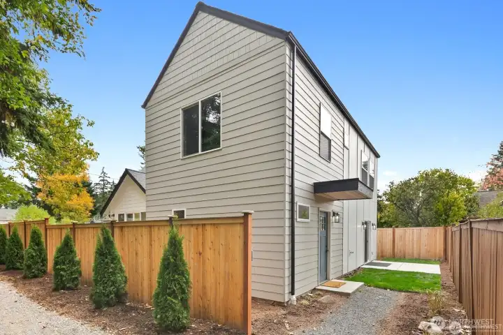 Luxury new construction with private setting and yard.