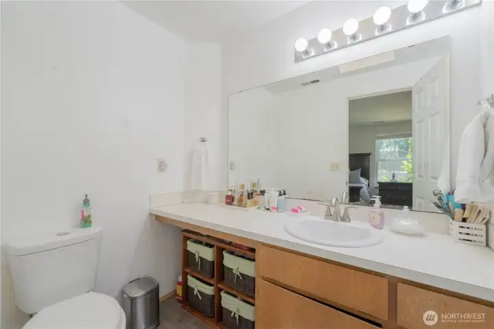 3/4 bath off primary bedroom with ample counter space.