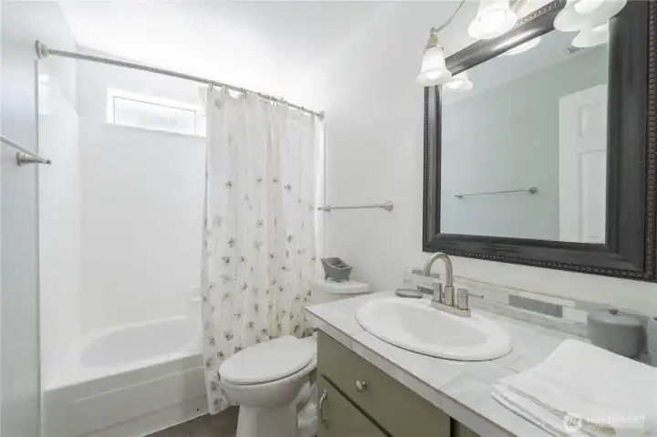 Full bath shared by 2 bedrooms.