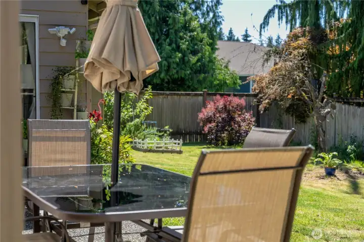Patio off dining room and convenient to kitchen.
