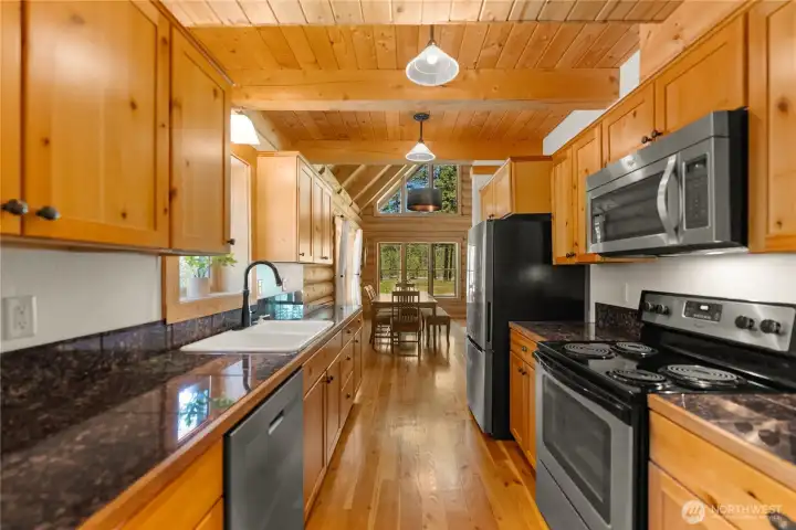 Prepare meals, share stories, and plan tomorrow's adventure from the heart of the cabin.