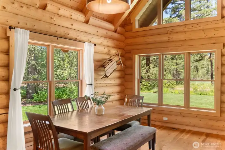 Dining space surrounded by river views.