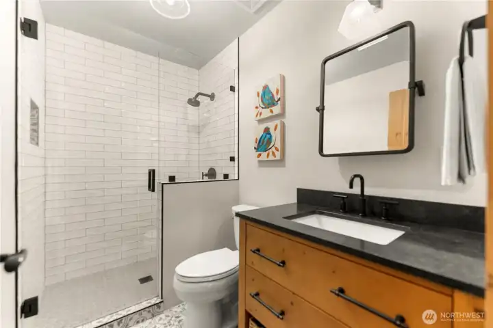 Updated bath with modern finishes and mountain style.