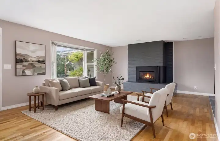 Inviting living area featuring a cozy gas fireplace as a warm focal point of the room.