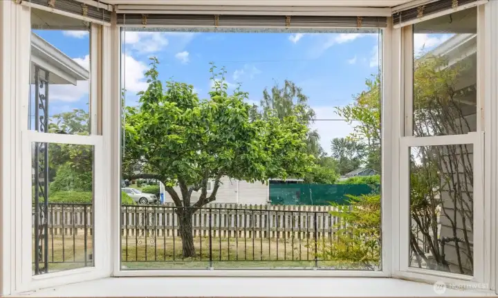 Large window in the living area bringing in abundant natural light.
